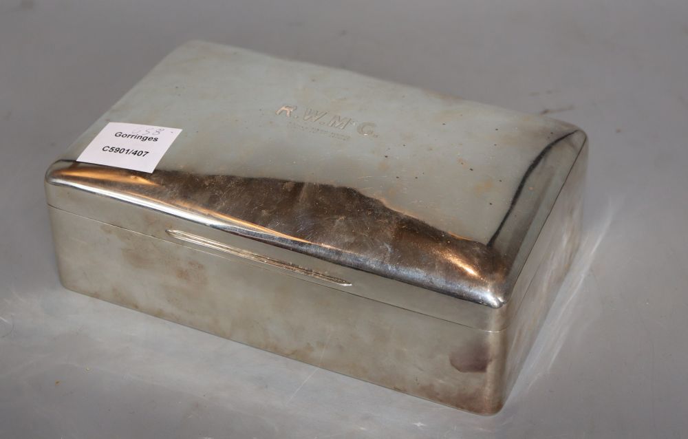 An Edwardian silver rectangular cigarette box, William Comyns, London, 1905, 22.8cm, gross 15.5 oz.